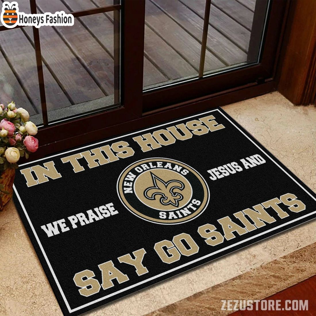 In this house we praise jesus and say go Saints doormat